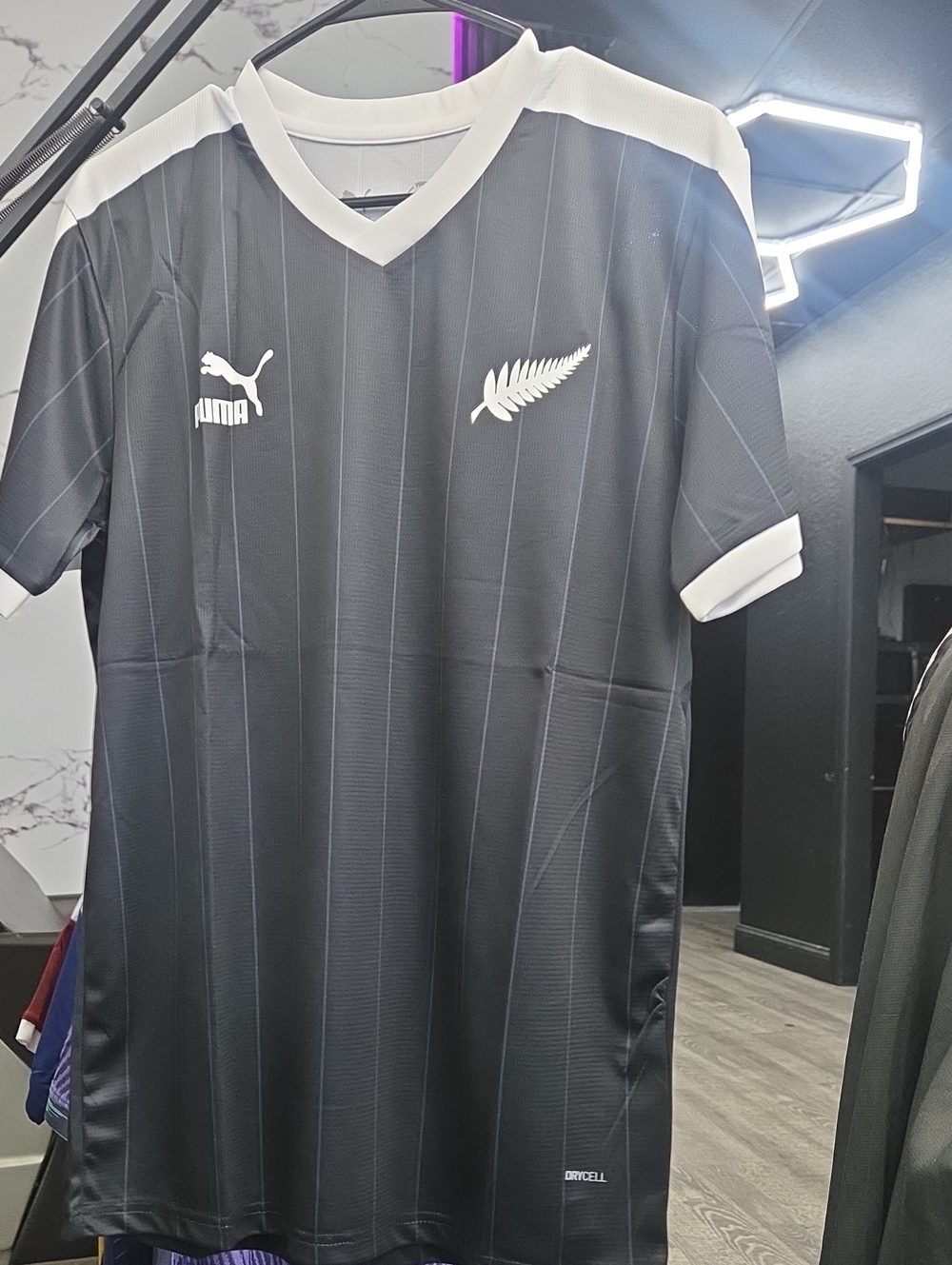 Puma Men’s Black Football Jersey with White Accents